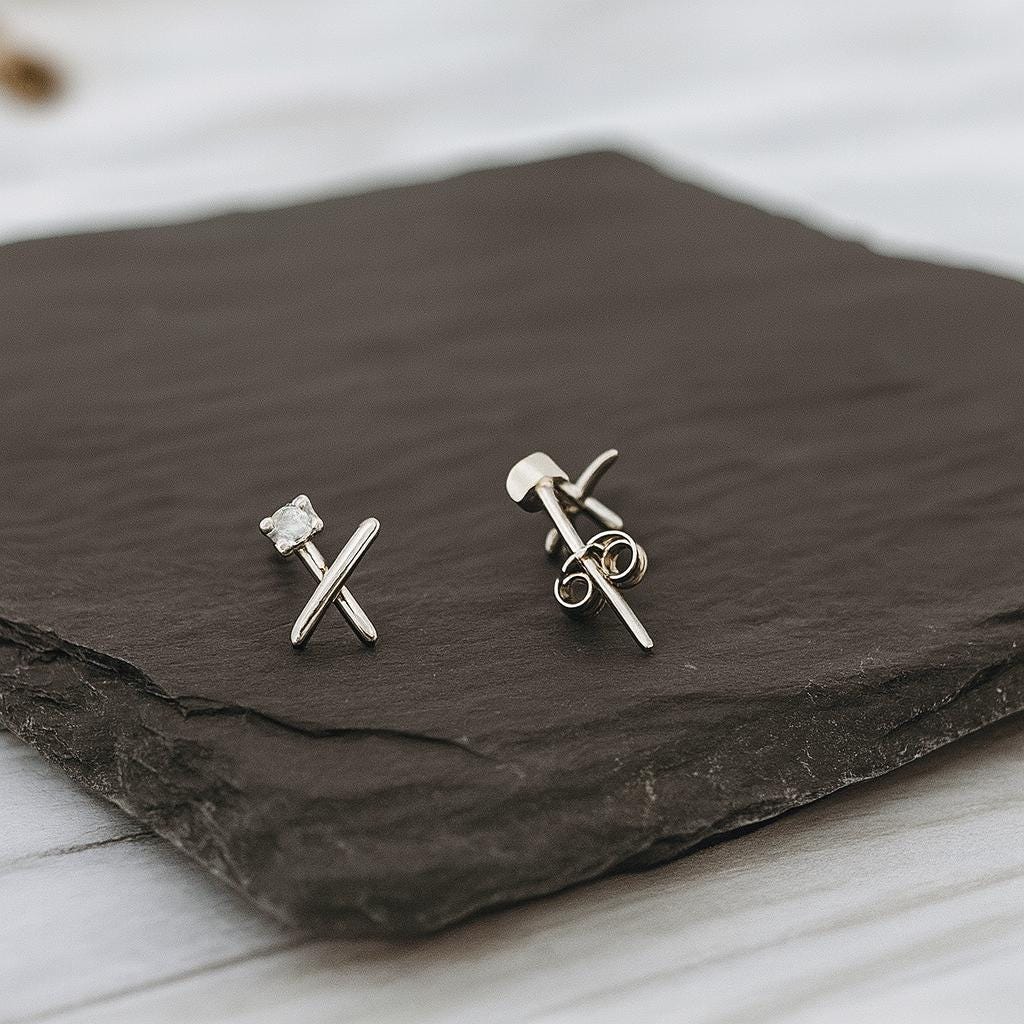 Sterling Silver Kiss Earrings: Cubic Zirconia X Studs