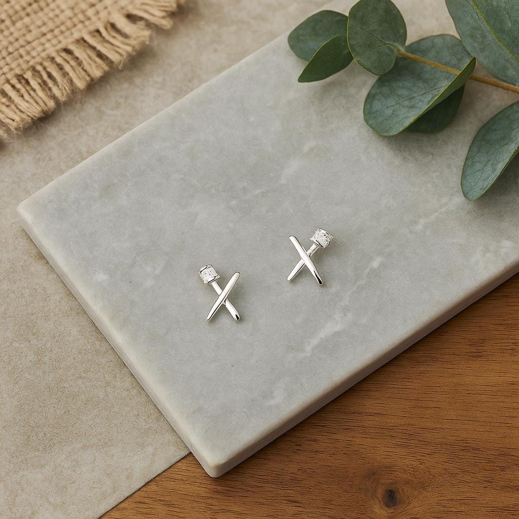 Sterling Silver Kiss Earrings: Cubic Zirconia X Studs